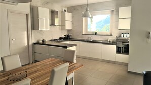 House | Private kitchen | High chair - Holiday Home in Leonforte With Private Pool (Leonforte)