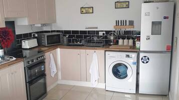 Apartment | Private kitchen | Fridge, microwave, oven, stovetop