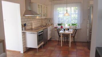 Apartment | Private kitchen | Oven, electric kettle, toaster