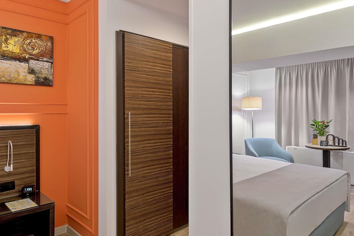 Ropa de cama de alta calidad y minibar