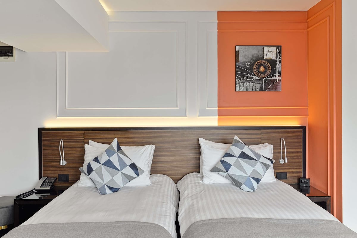 Ropa de cama de alta calidad y minibar