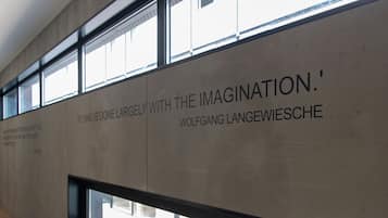 A wall with text and a window.