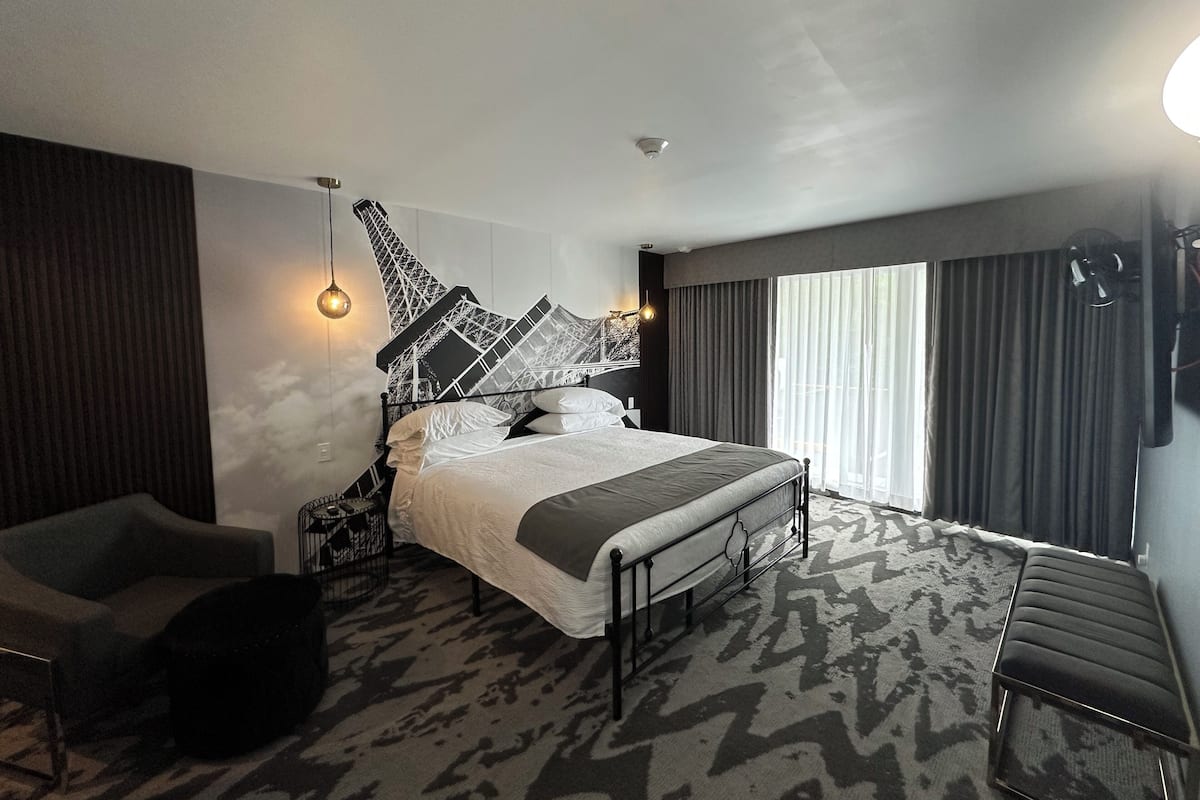 Luxury Suite | 1 bedroom, down comforters, blackout drapes, iron/ironing board