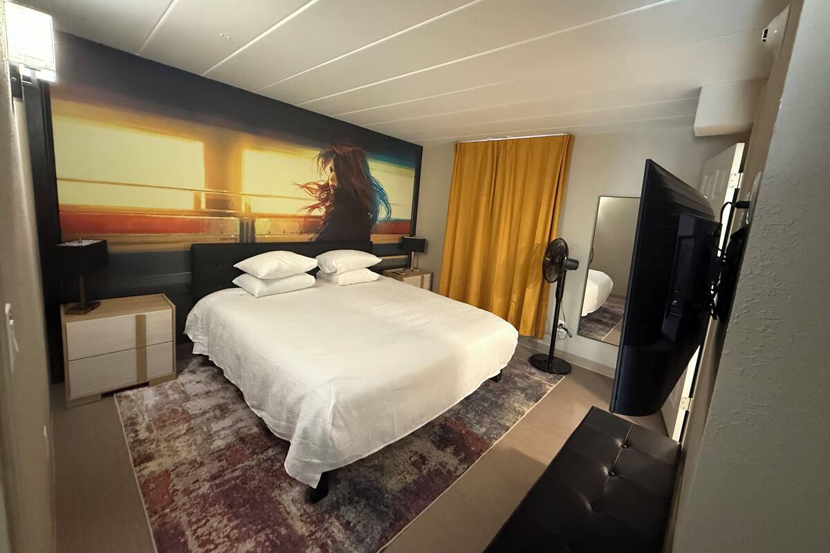 Luxury Suite | 1 bedroom, down duvets, blackout curtains, iron/ironing board