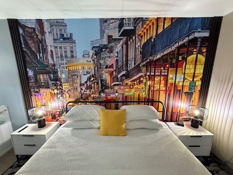 Deluxe Room | 1 bedroom, down comforters, blackout drapes, iron/ironing board