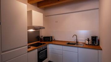 Apartment | Private kitchen | Oven, electric kettle, toaster