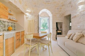 Deluxe Villa, 1 Bedroom, Garden View | Living room - Trullo del Lazzarone con Jacuzzi (Fasano)