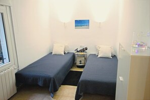 2 habitaciones, tabla de planchar con plancha, wifi y ropa de cama