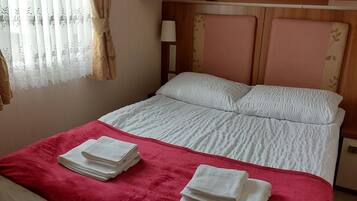 3 kamar tidur, setrika/meja setrika, Wi-Fi gratis, dan seprai linen