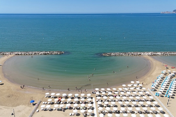 On the beach, white sand