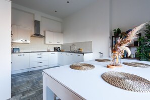 Fridge, microwave, dishwasher, coffee/tea maker - Leah Suite by Koya Homes - Sea View (Barry)