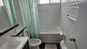 Hair dryer, towels, soap, shampoo