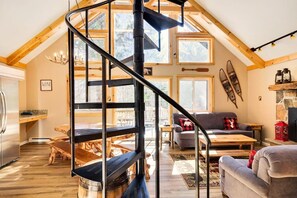 Smart TV, fireplace, table football, books