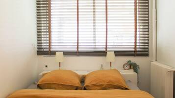 1 slaapkamer, een strijkplank/strijkijzer, wifi, beddengoed