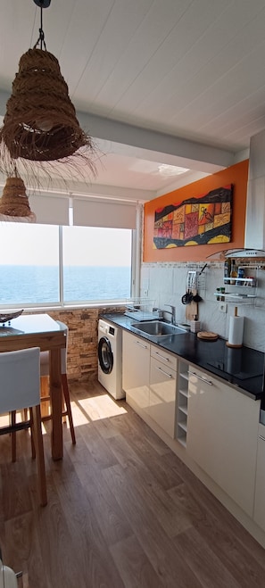 Panoramic Suite, Balcony, Sea View | Private kitchen | Full-size fridge, microwave, oven, stovetop