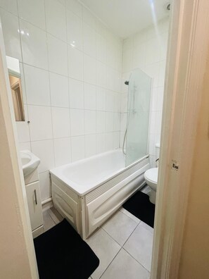 Apartment | Bathroom | Separate tub and shower, deep soaking tub, hair dryer, towels