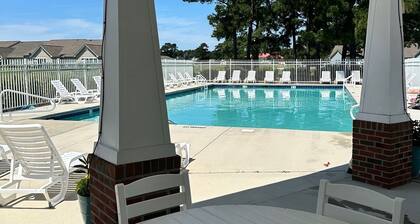 POOL AND PICKLEBALL! Perfectly located 1st floor condo, close to everything