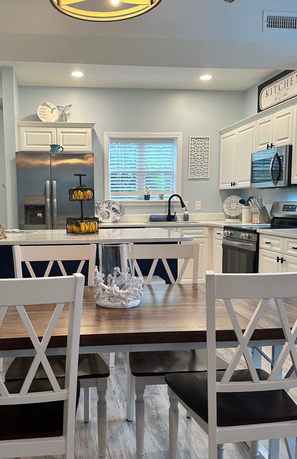 Kitchen table will seat 6 as well as two bar stools for extra space
