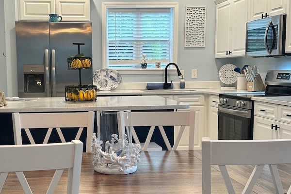 Kitchen table will seat 6 as well as two bar stools for extra space