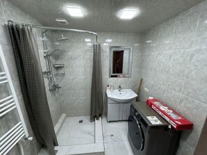 Hair dryer, towels, soap, shampoo
