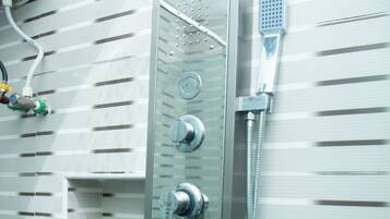 Luxury Apartment, 1 Queen Bed, Non Smoking | Bathroom | Shower, rainfall showerhead, towels, toilet paper