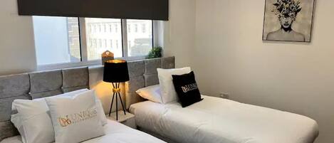 2 habitaciones, wifi gratis y ropa de cama