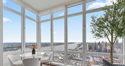 BREATHTAKING SKYLINE VIEWS! Corner Luxury 2BR/2BA near Times Sq + Video Tour