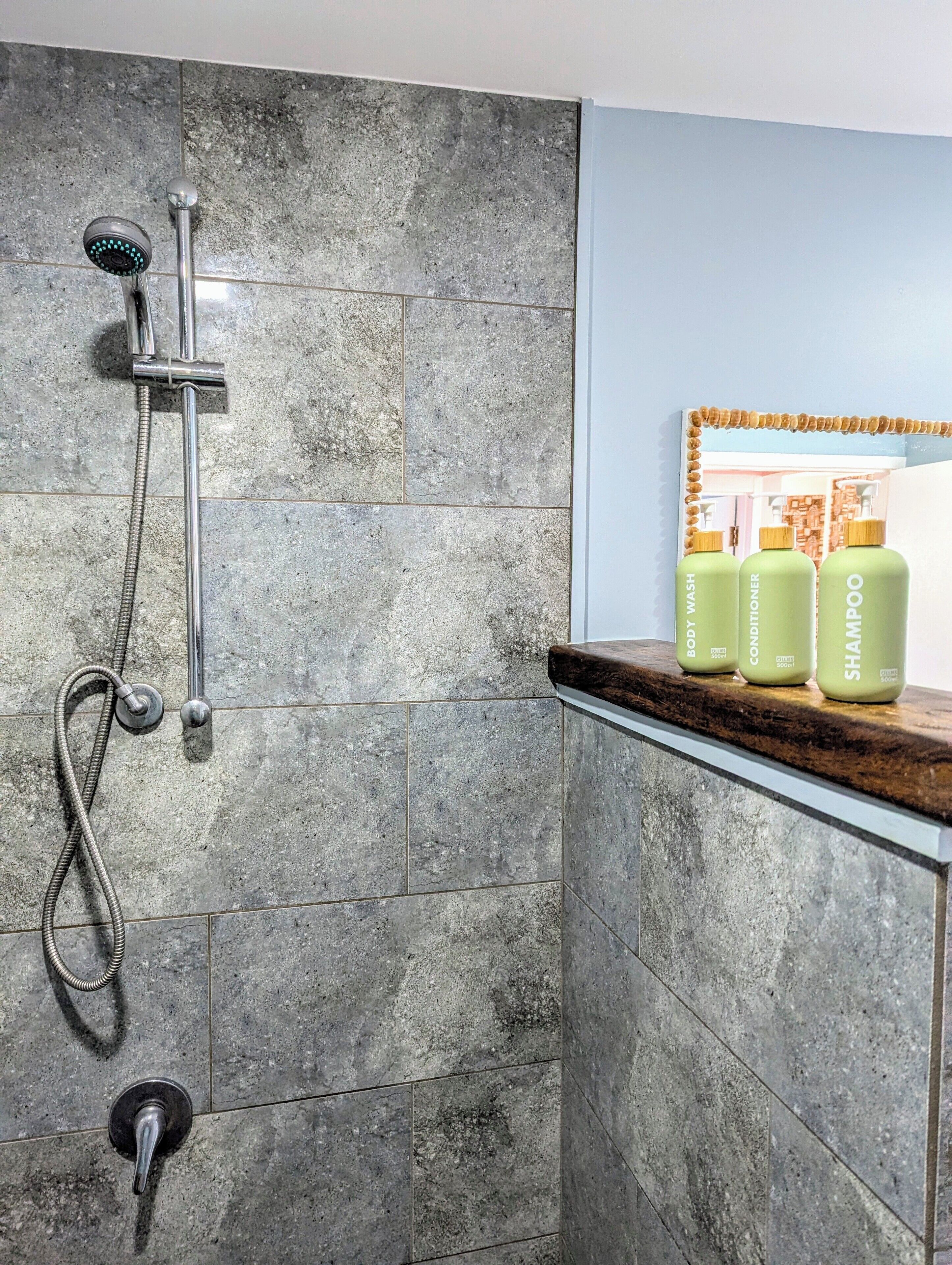 Shower, towels, soap, shampoo