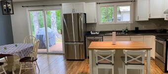 River front 4 season cottage with 2.5 acre serenity with mature trees around