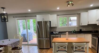 River front 4 season cottage with 2.5 acre serenity with mature trees around