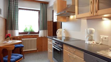 Apartment | Private kitchen | Electric kettle, highchair