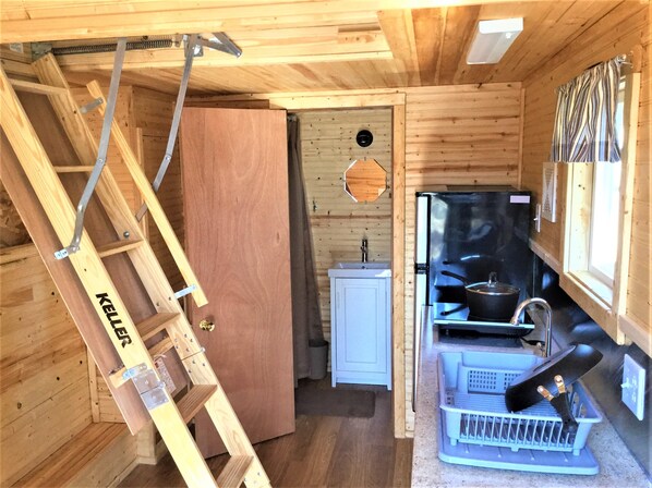 Interior - Sleeps up to 2, electric, water, kitchenette, full bathroom, air conditioned/heated. (Illinois City)