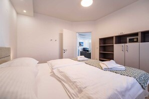 2 habitaciones, wifi gratis y ropa de cama 