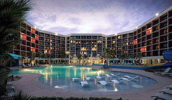 Indoor pool, seasonal outdoor pool, free cabanas, pool umbrellas at The Ellie Beach Resort Myrtle Beach, Tapestry By Hilton