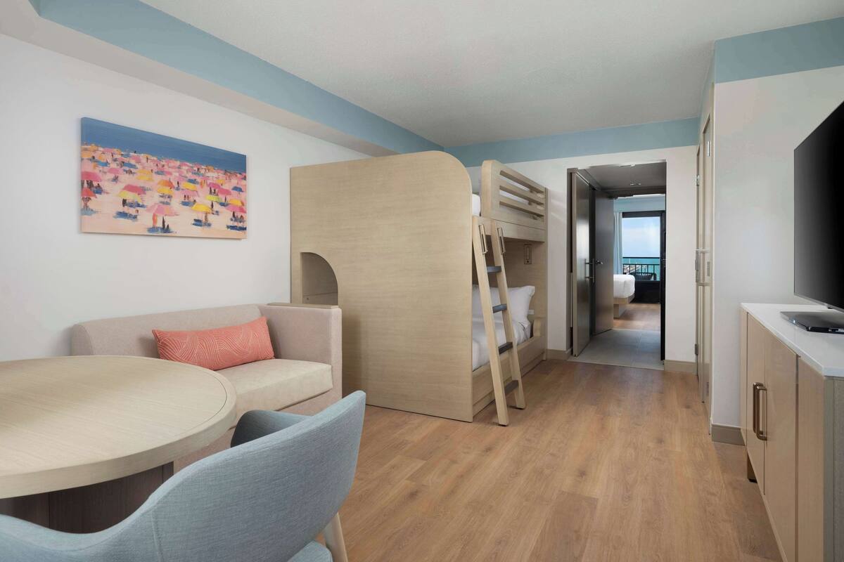 Suite, 1 Bedroom, Ocean View | Living area | 55-inch flat-screen TV with cable channels