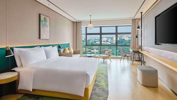 Premium Room, 1 King Bed | Down comforters, minibar, in-room safe, blackout drapes