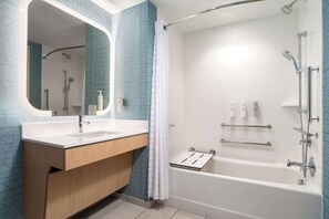 Combined shower/tub, hair dryer, towels, soap