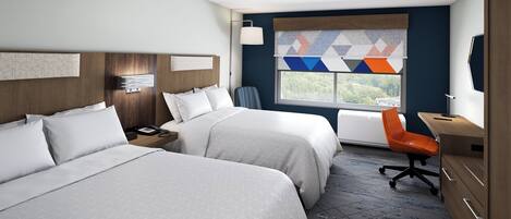 A hotel room with two beds, a desk, a chair, and a window with a view.