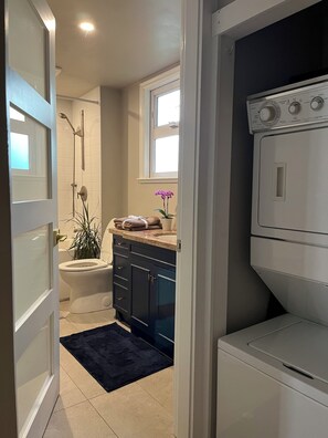 Hair dryer, towels, soap, toilet paper