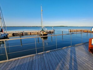 Enjoy waterfront views and access to a marina from this deck.