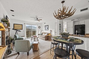 Little Cub | Sleeps 4 Mountain Views Indoor Pool & Hot Tub | Living area - Deer Ridge Mountain Resort (Gatlinburg)