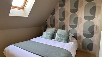 3 slaapkamers, een strijkplank/strijkijzer, wifi, beddengoed