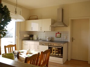 Apartment | Private kitchen | Oven, electric kettle, toaster