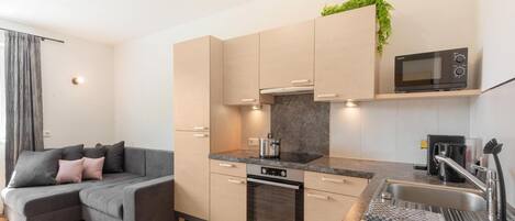 Apartment | Private kitchen | Electric kettle, toaster, highchair