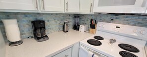 Condo, Multiple Beds, Patio, Pool View (Fiesta Sol #110) | Private kitchen | Fridge, microwave, oven, stovetop