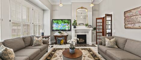 Smart TV, fireplace, books