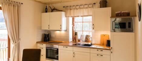 Appartement | Cuisine privée | Un four