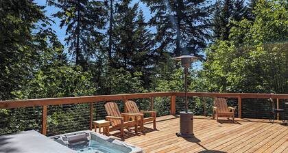 Secluded forest retreat with huge deck, large hot tub, great views.
