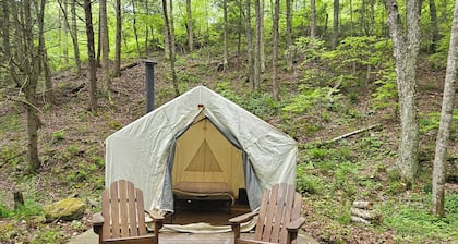 Family and pet friendly campsite.
Camp by a brook in a serene mountain setting
