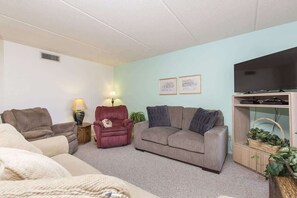 Condo, Multiple Beds, Balcony, Pool View (Padre Oasis #302) | Living area | 42-inch flat-screen TV with digital channels